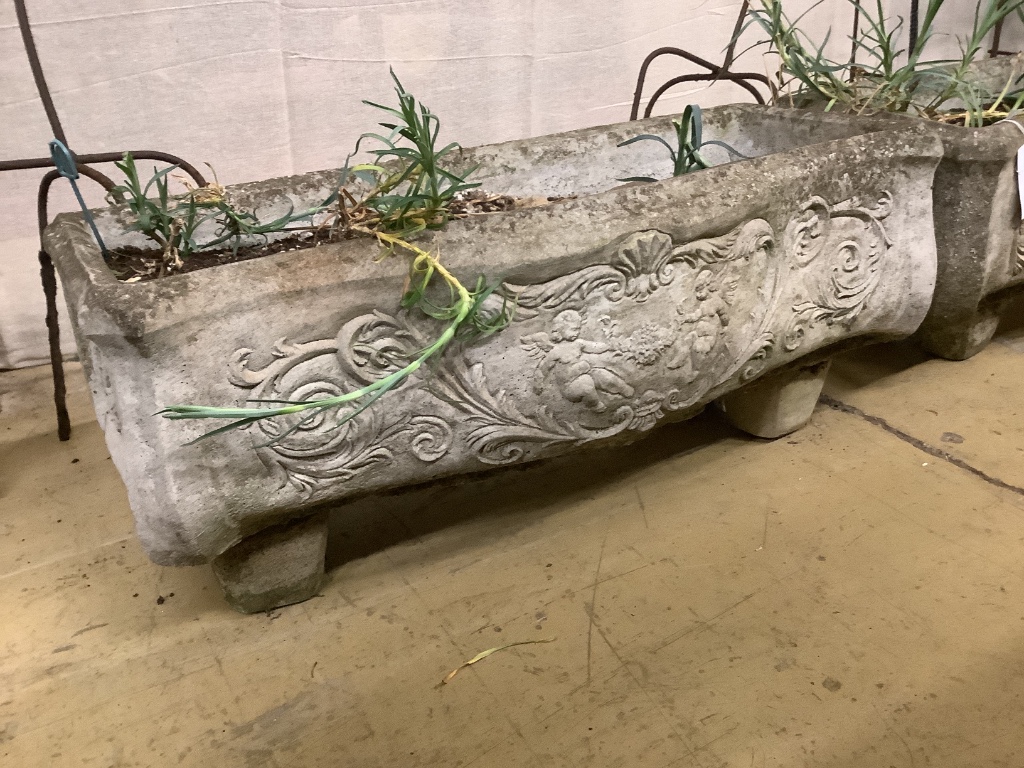 A pair of reconstituted stone serpentine front rectangular garden planters, width 73cm, depth 32cm, height 28cm